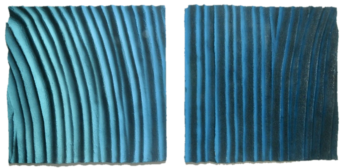 Ebb and Flow, diptych of two sculptural relief panels, one bright and one dark, breathing in opposite directions, cut out along its carved edges